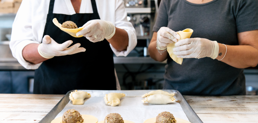 FOUND/LA Entrepreneur, Lia Hirtz, Founder of World Empanadas and her sister making empanadas by hand